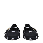 Dolce & Gabbana black fabric ballet flats with round toe and sleek design, perfect for casual or dressy wear.