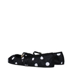 Dolce & Gabbana black fabric ballet flats showing sleek design and rounded toe on a plain background.