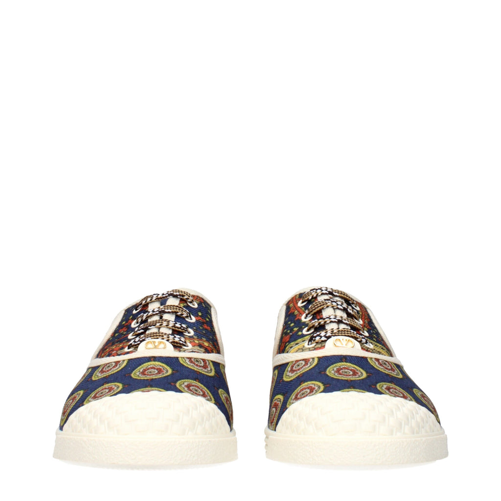 Valentino Garavani multicolor fabric low top sneakers with white soles and vibrant design details on a white background.