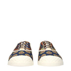 Valentino Garavani multicolor fabric low top sneakers with white soles and vibrant design details on a white background.