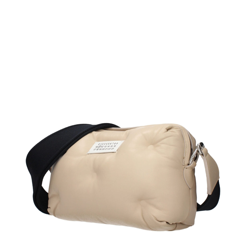 Beige leather Maison Margiela clutch bag with minimalist design and subtle branding, perfect for elegant evening or day use.