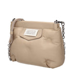 Maison Margiela beige leather crossbody bag with adjustable strap and minimalist design, showing smooth leather surface.