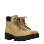Givenchy brown leather ankle boots with sleek design and pointed toes, stylish footwear for casual or formal outfits.