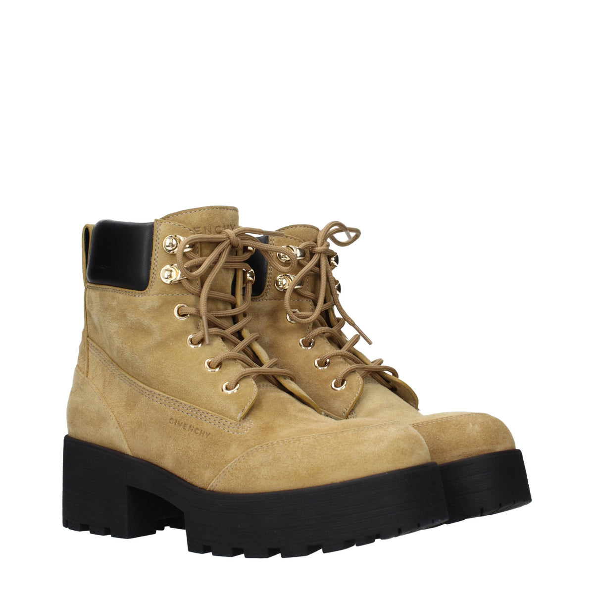 Givenchy brown leather ankle boots with sleek design and pointed toes, stylish footwear for casual or formal outfits.