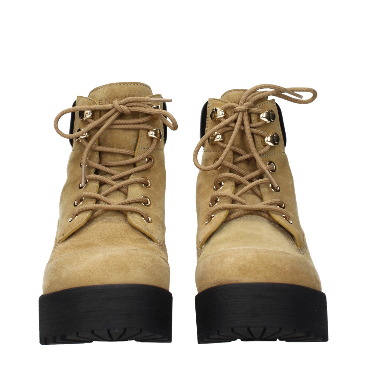 Givenchy brown leather ankle boots with sleek design and pointed toes, perfect for stylish everyday wear.
