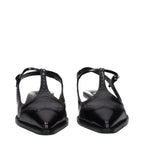 Black leather Miu Miu mid heel pumps with rounded toe and sleek design, perfect for elegant and stylish footwear.