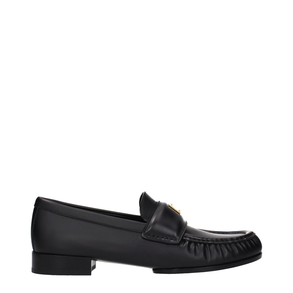 Givenchy black leather slip-on loafers with sleek design and polished finish, featuring classic silhouette and subtle branding.