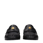 Givenchy black leather slip-on loafers featuring sleek design and classic style, perfect for elegant casual wear.