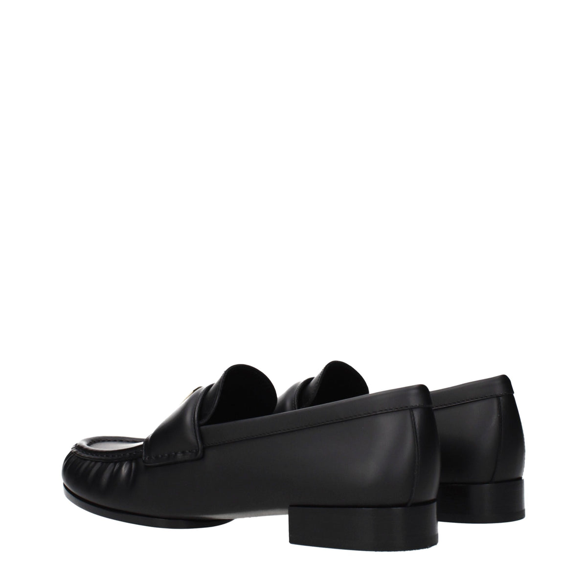 Givenchy black leather slip-on loafers with sleek design and polished finish, showcasing the stylish men's footwear.