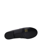 Givenchy black leather slip-on loafers with sleek design and polished finish, perfect for stylish formal or casual wear.