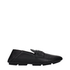 Black leather slip-on loafers by Dolce & Gabbana featuring sleek design and polished finish.