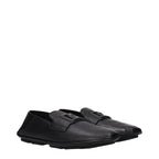 Black leather slip-on loafers by Dolce & Gabbana with sleek design and subtle branding, perfect for stylish casual or formal wear.