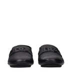 Black leather slip-on loafers by Dolce & Gabbana featuring a sleek design and classic silhouette.