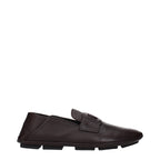Dolce & Gabbana brown leather slip-on loafers with sleek design and classic stitching on a neutral background.