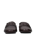 Dolce & Gabbana brown leather slip-on loafers with sleek design and classic stitching, perfect for stylish casual wear.
