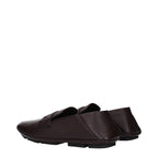 Dolce & Gabbana brown leather slip-on loafers with sleek design and classic style, perfect for casual or formal wear.