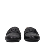 Black leather Dolce & Gabbana slip-on loafers with sleek design and subtle stitching details.