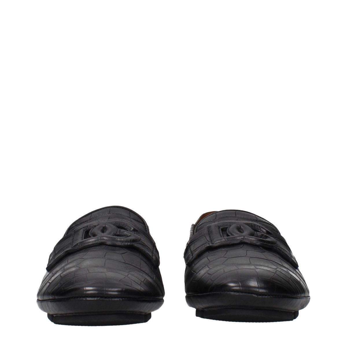 Black leather Dolce & Gabbana slip-on loafers with sleek design and subtle stitching details.