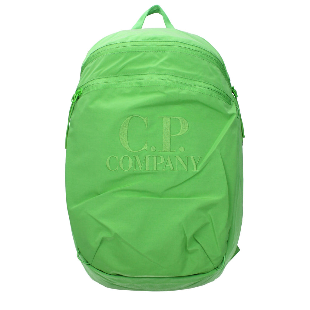 C.P. Company green fabric backpack with adjustable straps and front pocket, designed for everyday use and durability.