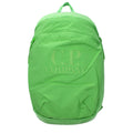 C.P. Company green fabric backpack with adjustable straps and front pocket, designed for everyday use and durability.