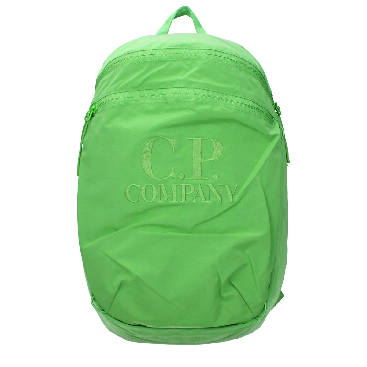 C.P. Company green fabric backpack with adjustable straps and front pocket, designed for everyday use and durability.