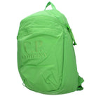 C.P. Company green fabric backpack with adjustable straps and multiple compartments, designed for everyday use.