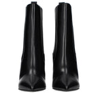 Valentino Garavani black leather ankle boots with sleek design and pointed toes, featuring subtle branding details.