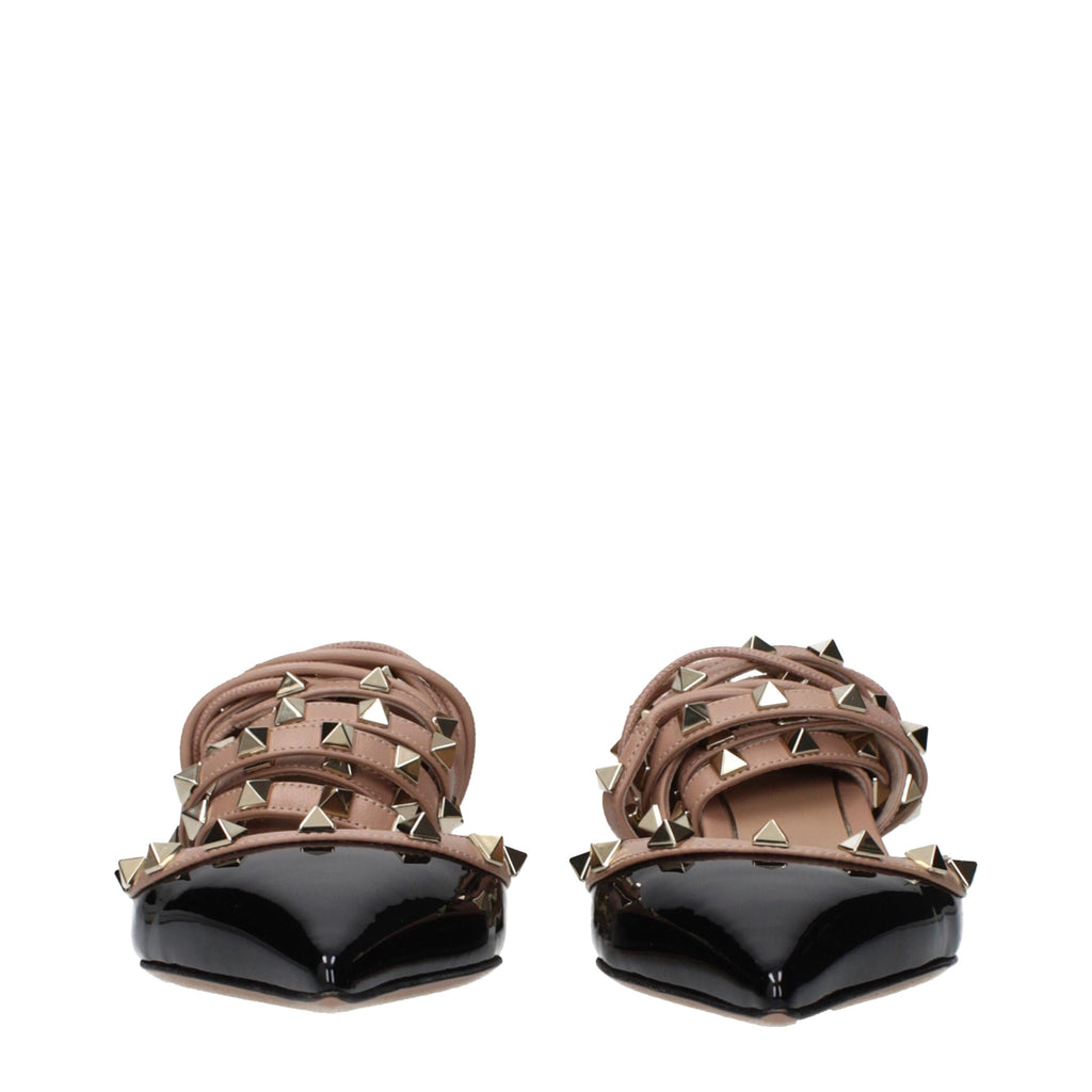 Black leather strap-on sandals by Valentino Garavani featuring sleek straps and stylish design, perfect for elegant summer footwear.