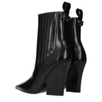 Black leather ankle boots by Valentino Garavani featuring sleek design and pointed toes.