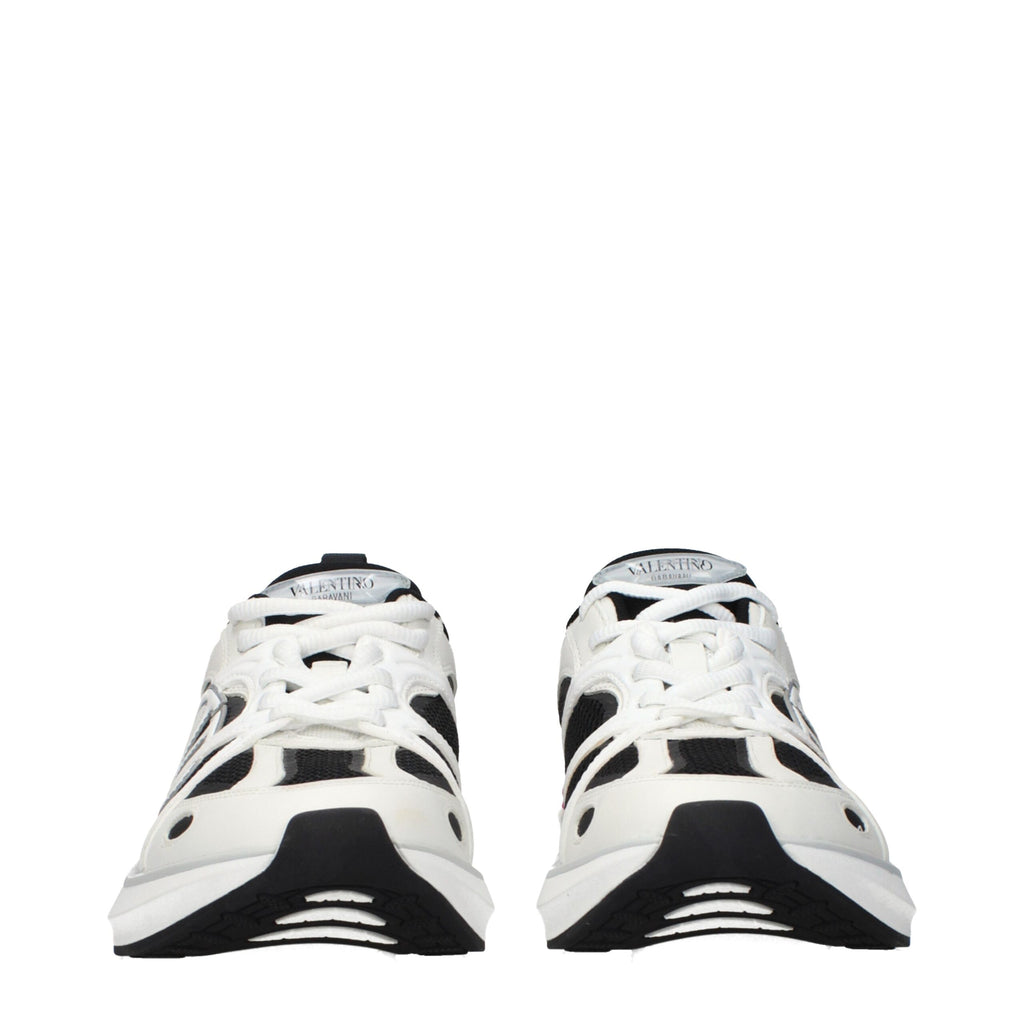Valentino Garavani white fabric athletic sneakers with stylish design and comfortable fit, perfect for casual and athletic wear.