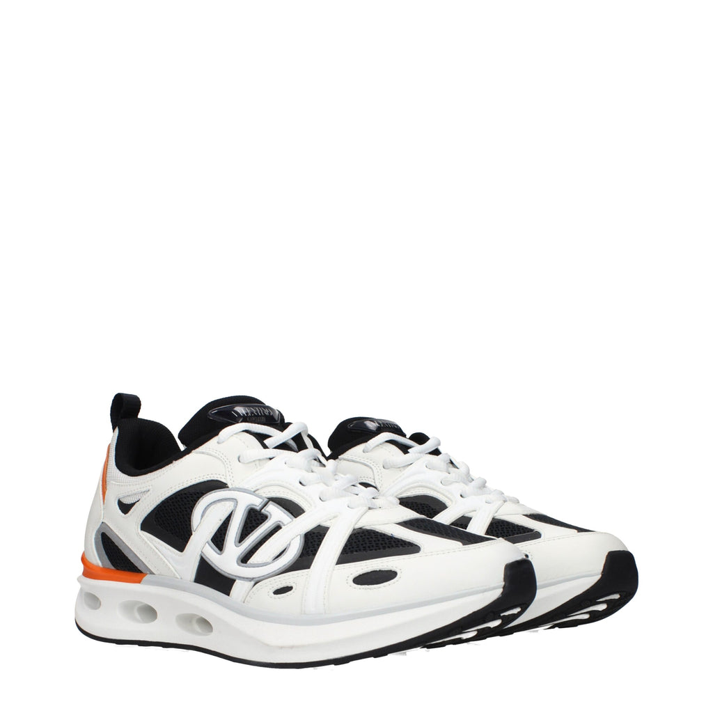 Valentino Garavani white fabric athletic sneakers with sleek design and comfortable soles, ideal for casual and sporty wear.