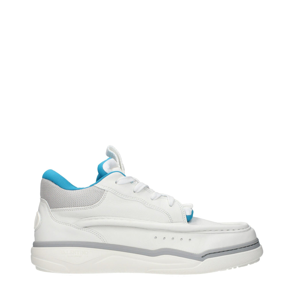 Valentino Garavani white leather low top sneakers with clean design and lace-up closure, perfect for casual wear.