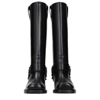 Black leather boots from Valentino Garavani with sleek design and polished finish, featuring pointed toes and ankle-high style.