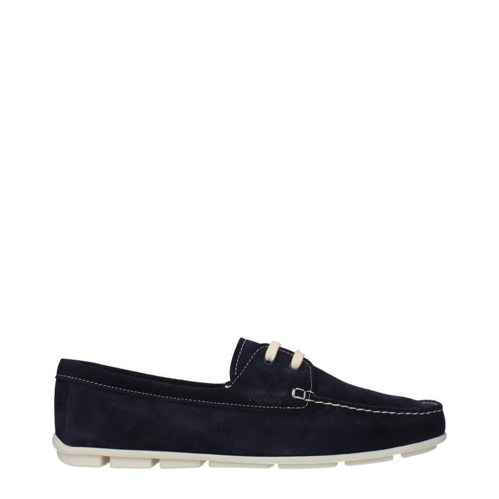 Prada blue leather slip-on loafers with sleek design and minimal detailing, perfect for stylish casual or formal wear.