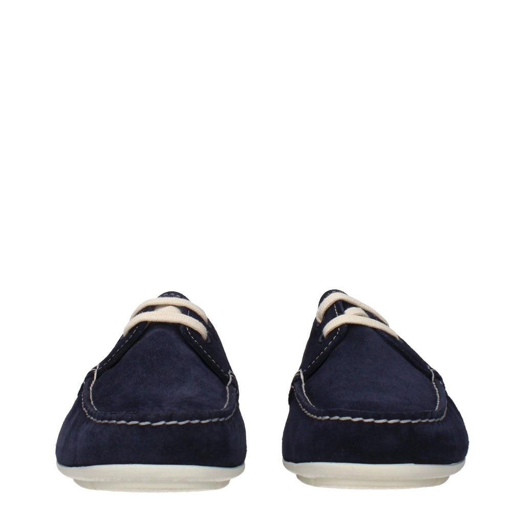Prada blue leather slip-on loafers with sleek design and refined stitching, perfect for stylish casual or formal wear