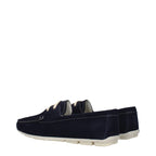 Prada blue leather slip-on loafers with sleek design and smooth finish, stylish footwear for men or women.