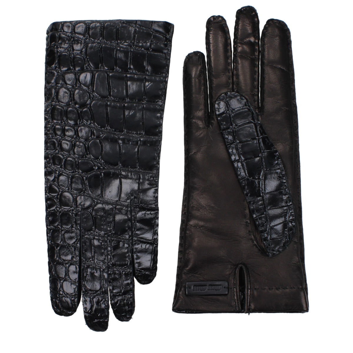 Black leather gloves by Miu Miu with sleek design and stitching details, perfect for stylish winter accessories.