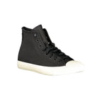 Black Converse Nero leather unisex sneaker featuring classic design and white rubber sole, suitable for casual wear.