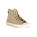 Beige leather Converse unisex sneaker with white rubber sole and classic lace-up design, stylish casual footwear.