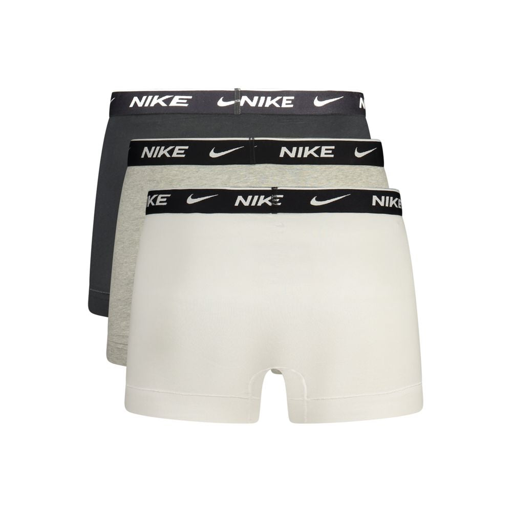 Nike grey cotton men's boxer shorts with elastic waistband and soft fabric, comfortable everyday underwear.