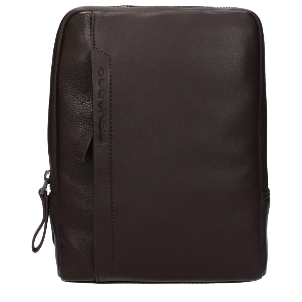Piquadro brown leather crossbody bag with adjustable strap and sleek design, showcasing fine craftsmanship and premium material.