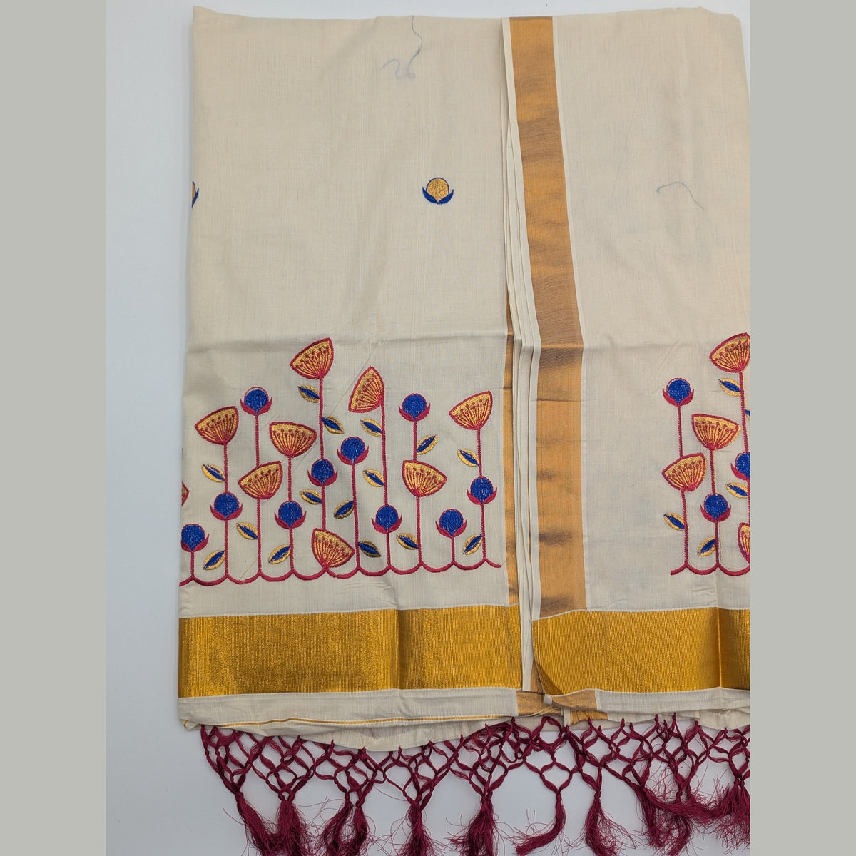 Tissue Silk saree with floral design in blue,red and gold combo Eljoys Fashion
