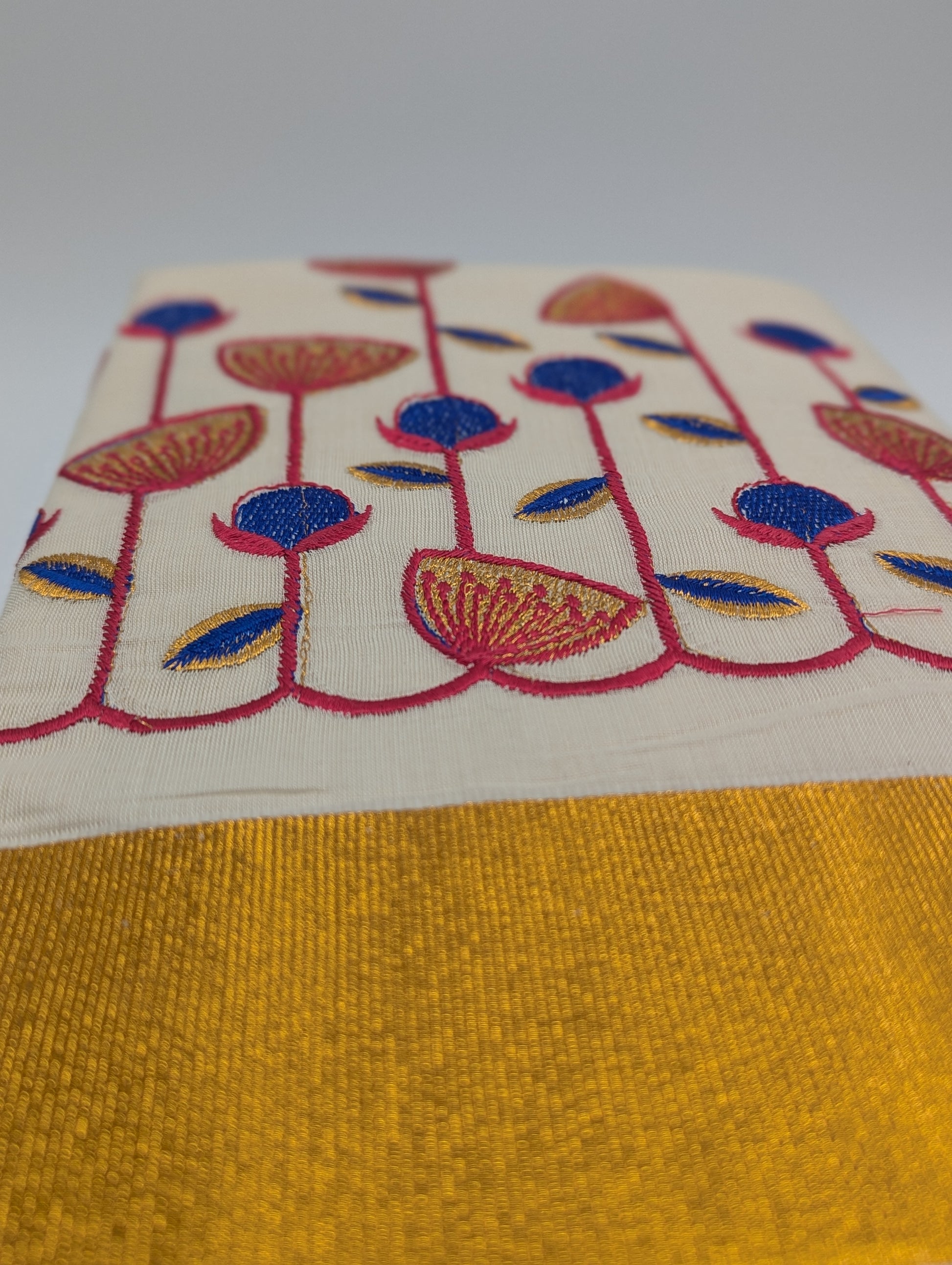Tissue Silk saree with  floral design in blue,red and gold combo - Eljoys Fashion 