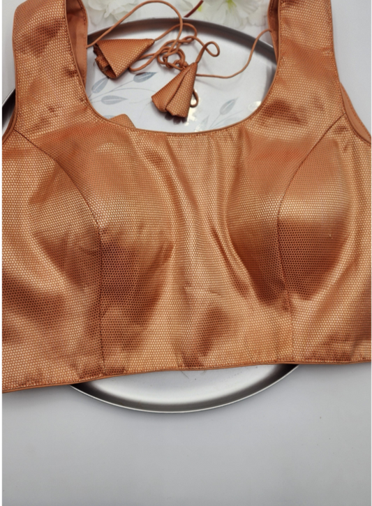 Brocade blouse with embedded floral design in Gold and light red shade  sleeveless Free size