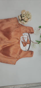 Brocade blouse with embedded floral design in Gold and light red shade  sleeveless Free size