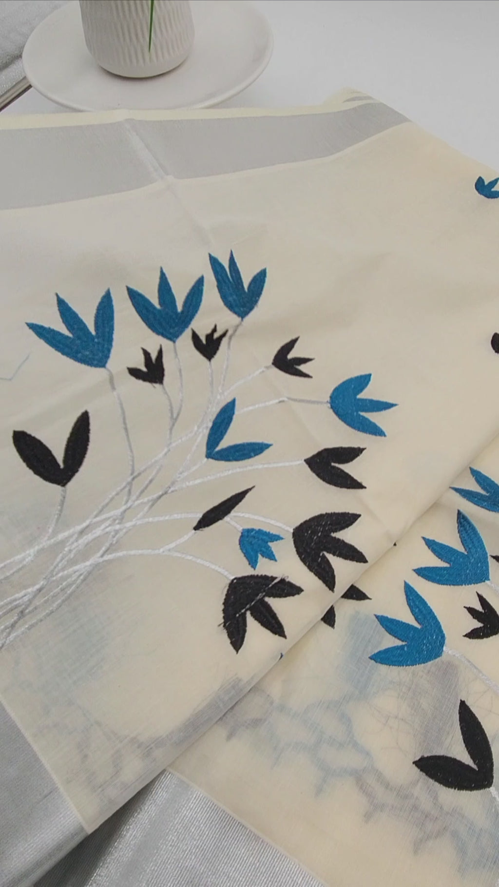 Tissue Silk Saree featuring Silver, Blue and Black floral design with Silver border 2106