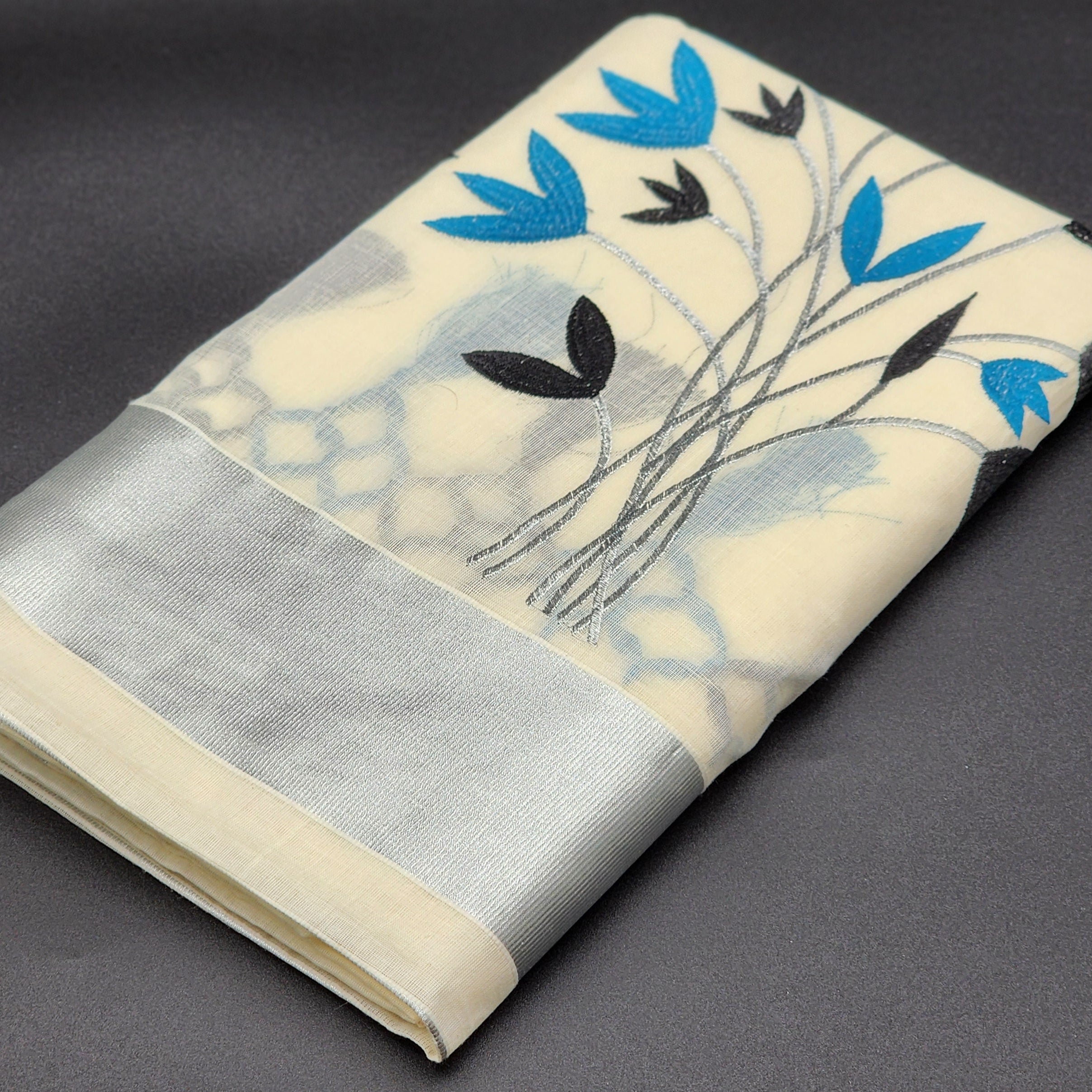Tissue Silk Saree featuring Silver, Blue and Black floral design with Silver border 2106