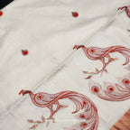 Saree 4 inch wide copper border with Tassel works ,The body is an embroidered red peacock on a golden branch 2147