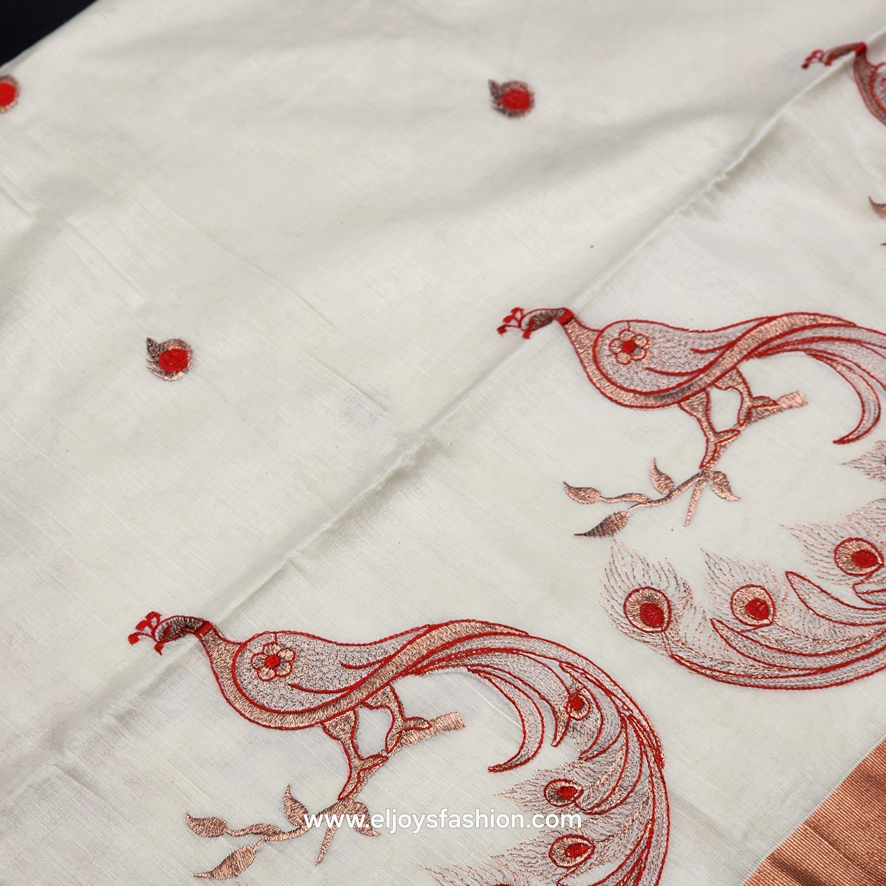 Saree 4 inch wide copper border with Tassel works ,The body is an embroidered red peacock on a golden branch 2147