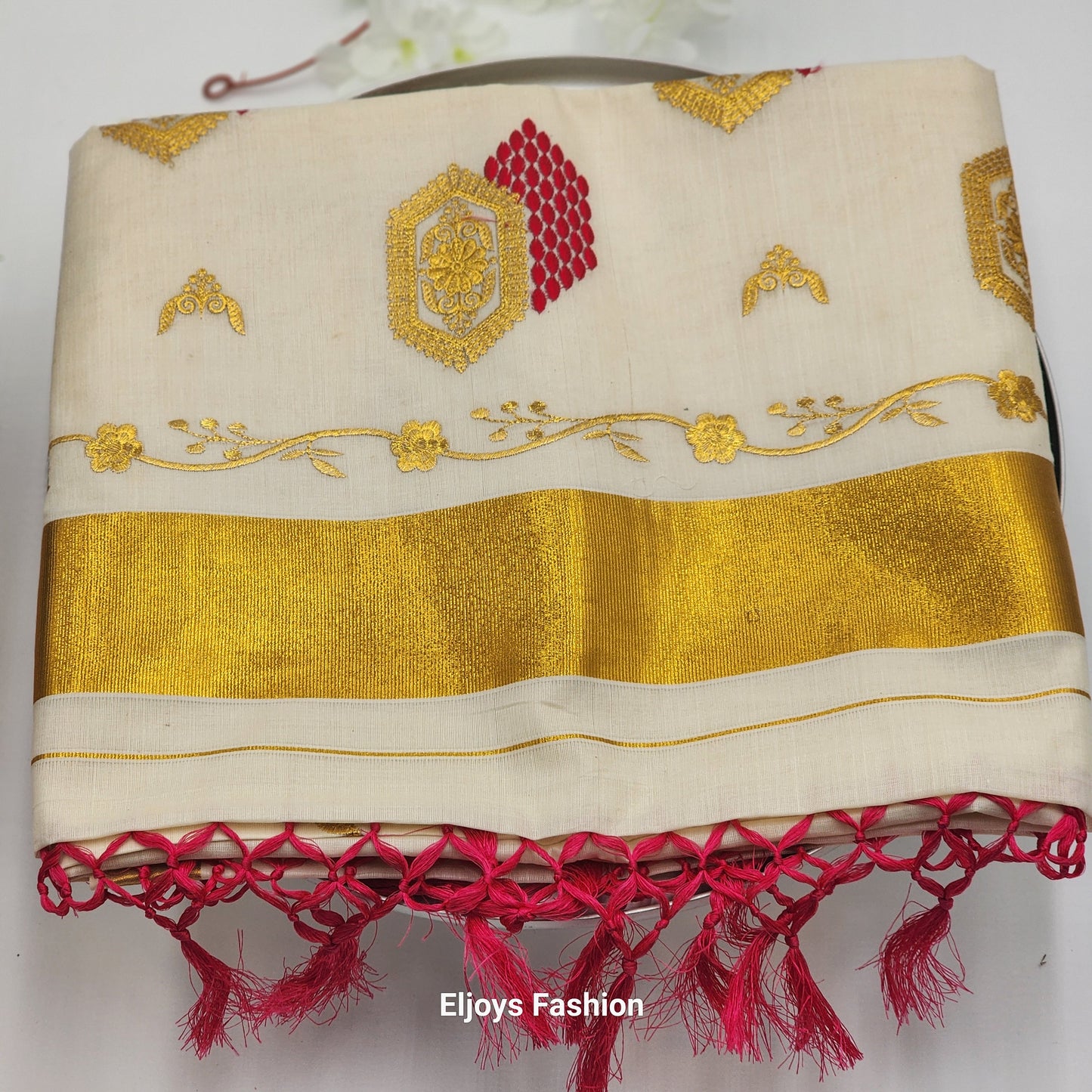Tissue Silk South Indian Saree with Gold borders and Red Patterns